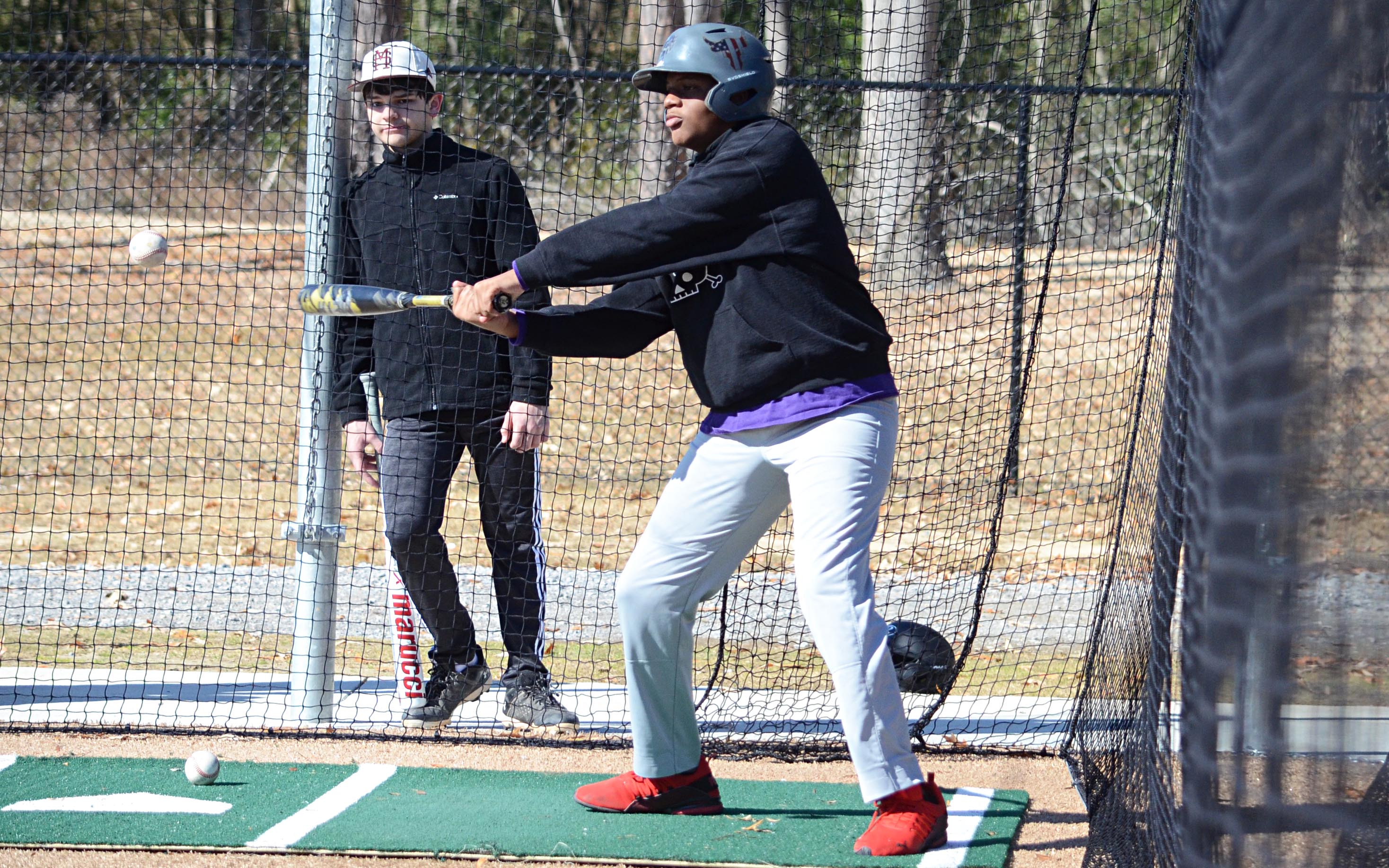 Michael Alexander swings for the fences