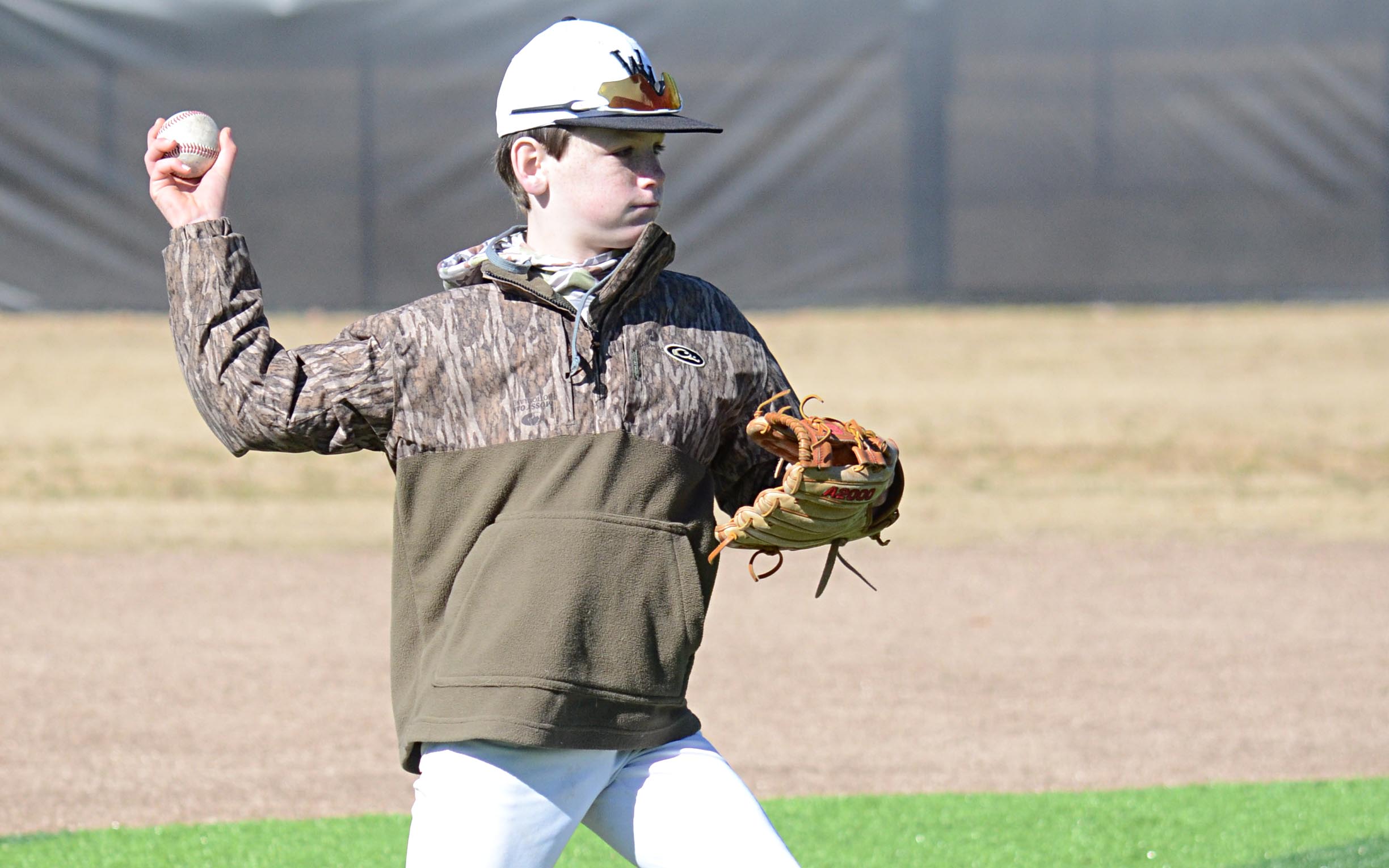 Brody Brumfield practices a pick-off move.