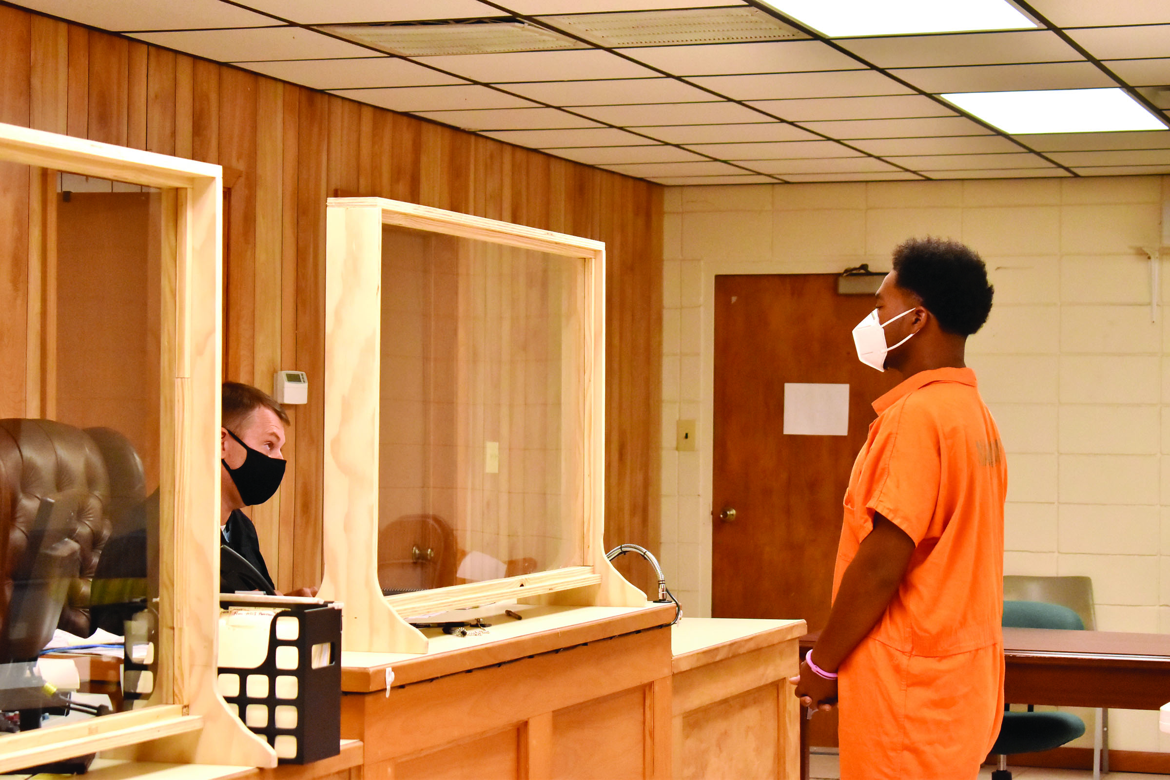 Bryston Martin stands before Municipal Court Judge Donovan McComb Monday afternoon. Martin was charged with second degree murder. By Susan Amundson