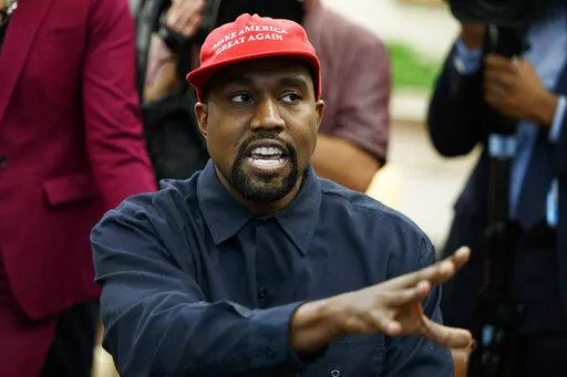 Rapper Kanye West speaks during a meeting in the Oval Office of the White House with President Donald Trump, Thursday, Oct. 11, 2018, in Washington. Kanye West was escorted out of the California headquarters of athletic shoemaker Skechers Wednesday, Oct. 26, 2022 after he showed up unannounced. Skechers says West, also known as Ye, also engaged in unauthorized filming at its corporate headquarters in Manhattan Beach and was escorted out by two executives.  (AP Photo/Evan Vucci, File)