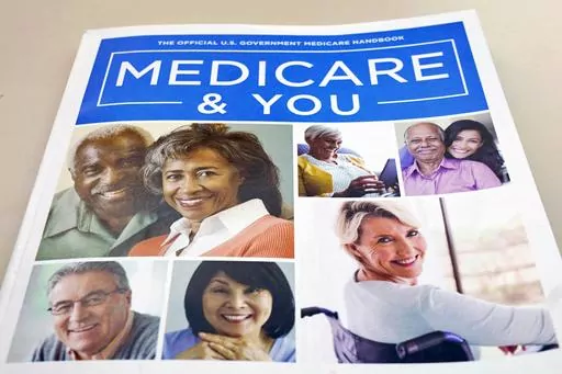 The U.S. Medicare Handbook is photographed in Washington, Nov. 8, 2018. Obesity drugs like Wegovy and Zepbound that are capturing the attention of celebrities and showing promising results in helping people shed pounds will stay out of reach for America's older adults. A decades-old law on the books bans Medicare from paying for weight loss drugs. (AP Photo/Pablo Martinez Monsivais, File)