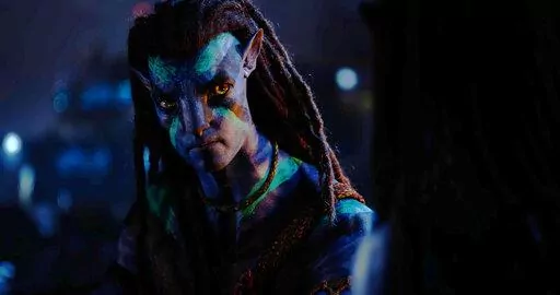 This image released by 20th Century Studios shows Sam Worthington, as Jake Sully, in a scene from "Avatar: The Way of Water." (20th Century Studios via AP)