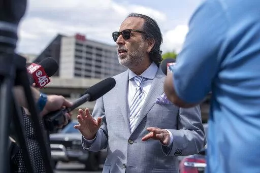 Attorney Drew Findling makes remarks regarding his client, Clayton County Sheriff Victor Hill, during a news conference outside of the Richard B. Russell Federal building in Atlanta, April 27, 2021. As more details emerge about the Georgia investigation into possible illegal attempts to influence the outcome of the state’s 2020 election, people of potential interest are hiring high-profile attorneys. Word broke Thursday that former President Donald Trump has hired prominent Atlanta criminal de
