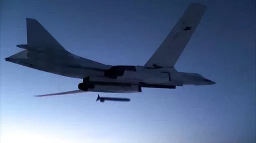 In this photo taken from a video distributed by Russian Defense Ministry Press Service, on Dec. 9, 2020, a Russian Tu-160 strategic bomber fires a cruise missile at test targets, during a military drills, Russia. The Russian Defense Ministry said that the military will hold drills involving tactical nuclear weapons – the first time such exercise was publicly announced by Moscow. (Russian Defense Ministry Press Service via AP, File)