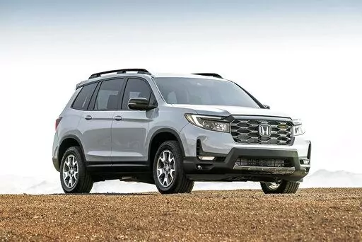 This photo provided by Honda shows the 2022 Honda Passport, a midsize two-row SUV that received bolder styling for the 2022 model year. (Courtesy of American Honda Motor Co. via AP)