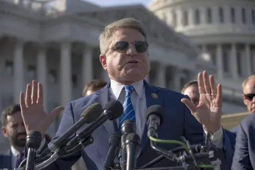 House Foreign Affairs Committee Chairman Michael McCaul, R-Texas, speaks to reporters about his panel's Afghanistan Report and the findings of its three-year investigation into the U.S. withdrawal from Afghanistan, at the Capitol in Washington, Monday, Sept. 9, 2024. He is joined by families of the military members who were killed by a Taliban bomber during the evacuation. (AP Photo/J. Scott Applewhite)