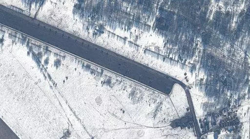 This Feb. 15, 2022 satellite image provided by Maxar Technologies shows attack helicopters deployed at Zyabrovka airfield in Belarus. (Satellite image ©2022 Maxar Technologies via AP)