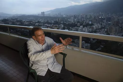 Venezuelan presidential candidate Edmundo González Urrutia of the Democratic Unitary Platform (PUD), the alliance that brings together the main parties and leaders of the opposition, speaks during an interview at his home in Caracas, Venezuela, Thursday, May 9, 2024. (AP Photo/Ariana Cubillos)