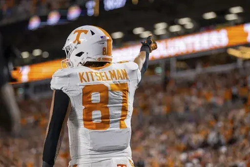 Tennessee tight end Miles Kitselman (87) celebrates a touchdown against North Carolina State during the second half of an NCAA football game Saturday, Sept. 7, 2024, in Charlotte, N.C. (AP Photo/Scott Kinser)