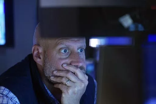 Specialist Meric Greenbaum works at his post on the floor of the New York Stock Exchange, Thursday, May 30, 2024. Most U.S. stocks are rising following mixed profit reports from big companies and signals that the economy may be cooling. (AP Photo/Richard Drew)