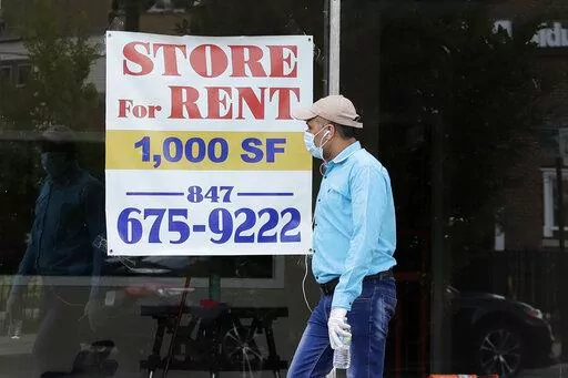 A Store For Rent sign is displayed at a retail property in Chicago, on June 20, 2020. As much as 20% of a federal pandemic relief program intended to help small businesses weather the COVID-19 outbreak is believed to have gone to fraudsters, while some 1.6 million applications for the loans may have been approved without even being evaluated. The program overseen by the U.S. Small Business Administration is one of the key targets of a Tuesday, June 14, 2022, congressional hearing that is expecte