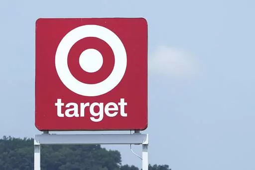 A sign outside a Target store is seen Wednesday, May 24, 2023, in Nashville, Tenn. On May 26, The Associated Press reported on stories circulating online incorrectly claiming Target’s Pride collection features a bathing suit for kids that is labeled “tuck-friendly.” (AP Photo/George Walker IV, File)