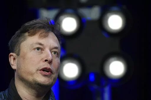 Elon Musk speaks at the SATELLITE Conference and Exhibition on March 9, 2020, in Washington. Musk posted video Wednesday, Oct. 26, 2022, showing him strolling into Twitter headquarters ahead of a Friday, Oct. 28, deadline to close his $44 billion deal to buy the company. (AP Photo/Susan Walsh, File)