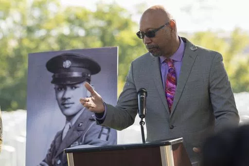 Steve Woodson speaks during a medal ceremony for his father, Cpl. Waverly B. Woodson Jr., to be posthumously honored with the Bronze Star and Combat Medic Badge, Oct. 11, 2023 at Arlington National Cemetery in Arlington, Va. Woodson Jr., a medic who was part of the only Black combat unit to take part in the D-Day invasion of France, is being posthumously awarded the Distinguished Service Cross. It's the military's second highest honor. The announcement was made Monday, June 3, 2024, by Sen. Chri