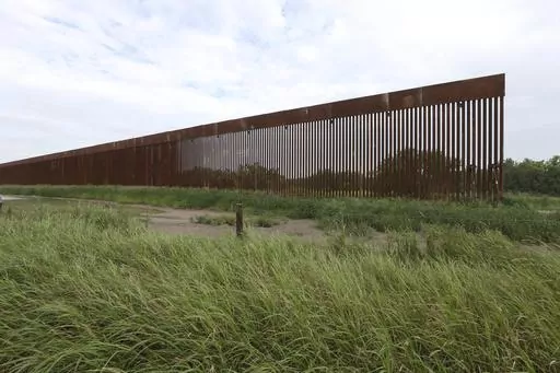 A border wall section stands on July 14, 2021, near La Grulla, Texas, in Starr County. On Wednesday, Oct. 4, 2023, the Biden administration announced that they waived 26 federal laws in South Texas to allow border wall construction, marking the administration’s first use of a sweeping executive power employed often during the Trump presidency. The Department of Homeland Security posted the announcement with few details outlining the construction in Starr County, Texas. (Delcia Lopez/The Monito