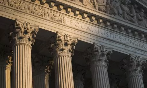 The Supreme Court in Washington is seen at sunset on Oct. 10, 2017. In a monthslong inquiry, which included reviewing tens of thousands of pages of documents from more than 100 public records requests, The Associated Press has examined what happens behind the scenes when Supreme Court justices travel to colleges and universities for lectures and other events. The AP learned the identities of donors and politicians invited to events with justices, details about the perks that have accompanied the