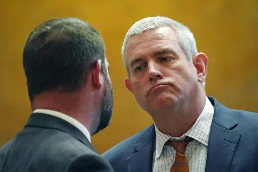 Speaker Philip Gunn, R-Clinton, right, listens to Rep. Kevin Felsher, R-Biloxi in the House Chamber, Monday, March 28, 2022, at the Mississippi Capitol in Jackson. (AP Photo/Rogelio V. Solis)