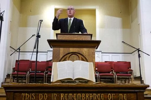 Pastor Bart Barber, president of the Southern Baptist Convention, preaches from the pulpit of the First Baptist Church of Farmersville, Texas, on Sunday, Sept. 25, 2022. For nearly a quarter-century, Barber enjoyed relative obscurity as a pastor in this town of 3,600, about 50 miles northeast of Dallas. That changed in June as delegates to the Southern Baptist Convention’s annual meeting in California, chose Barber to lead the nation’s largest Protestant denomination at a time of major crisi