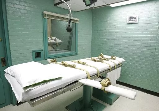 The gurney in Huntsville, Texas, where inmates are strapped down to receive a lethal dose of drugs, is shown May 27, 2008. Public support and use of the death penalty in 2022 continued its more than two-decade long decline in the U.S., and many of the executions that were carried out were “botched” or highly problematic, according to an annual report on capital punishment released Friday, Dec. 16. (AP Photo/Pat Sullivan, File)
