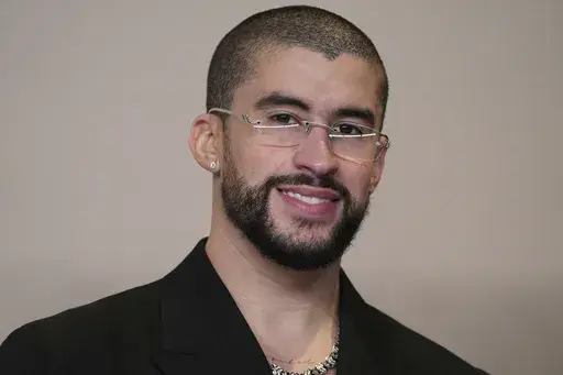 Bad Bunny poses in the press room at the Oscars on Sunday, March 10, 2024, at the Dolby Theatre in Los Angeles. (Photo by Jordan Strauss/Invision/AP, File)
