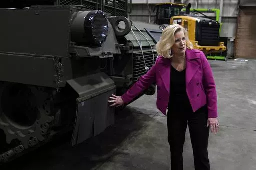 Secretary of the Army Christine Wormuth looks over the latest version of the M1A2 Abrams main battle tank as she tours the Joint Systems Manufacturing Center, Feb. 16, 2023, in Lima, Ohio. Two U.S. officials say Ukraine has sidelined U.S.-provided Abrams M1A1 battle tanks for now in its fight against Russia. This is in part because Russian drone warfare has made it too difficult for them to operate without detection or coming under attack. (AP Photo/Carlos Osorio, File)