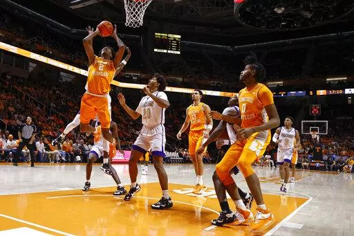 Tennessee forward Julian Phillips (2) shoots past Alcorn State forward Darryl Jordan (20) during the first half of an NCAA college basketball game Sunday, Dec. 4, 2022, in Knoxville, Tenn. (AP Photo/Wade Payne)