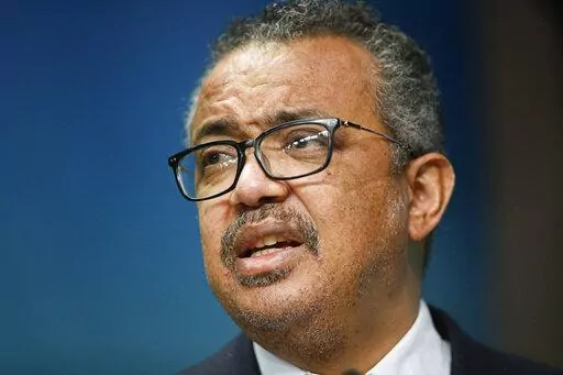The head of the World Health Organization, Tedros Adhanom Ghebreyesus speaks during a media conference at an EU Africa summit in Brussels on Feb. 18, 2022.  The World Health Organization says monkeypox still does not warrant being declared a global emergency even though it's spreading in more than 70 countries. The decision announced on Saturday was the second time within weeks that WHO’s emergency committee declined to classify the unprecedented outbreak of the once-rare disease as an emergen