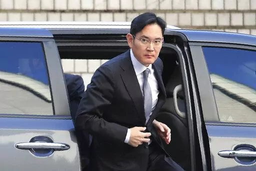 Samsung Electronics Co. Vice Chairman Lee Jae-yong gets out of a car at the Seoul High Court in Seoul, South Korea, Nov. 22, 2019. South Korea's president will pardon Samsung heir Lee Jae-yong with a year left on his sentence for bribing a president as part of a massive corruption scandal that toppled her government, the justice minister announced Friday, Aug. 12. 2022. (AP Photo/Ahn Young-joon, File)