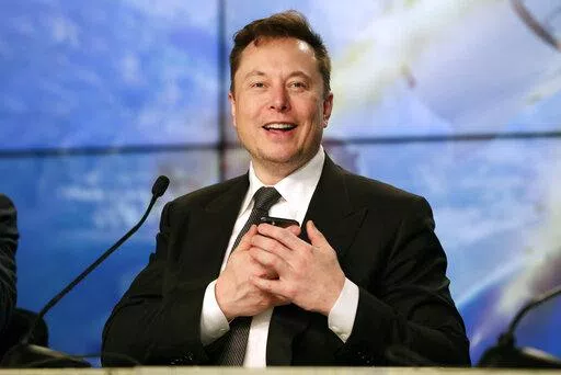 Elon Musk founder, CEO, and chief engineer/designer of SpaceX speaks during a news conference after a Falcon 9 SpaceX rocket test flight at the Kennedy Space Center in Cape Canaveral, Fla, Jan. 19, 2020. Musk won't be joining Twitter's board of directors as previously announced. The tempestuous billionaire remains Twitter’s largest shareholder. (AP Photo/John Raoux, File)