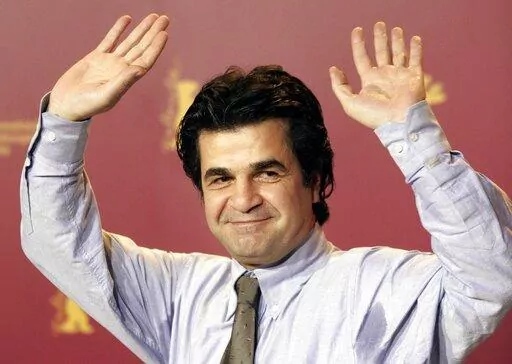 Iranian film director Jafar Panahi reacts as he attends the 56th Berlin Film Festival 'Berlinale' in Berlin, Feb. 17, 2006. Iranian authorities have arrested an internationally renowned filmmaker, media reported on Tuesday, July 12, 2022, the third Iranian director to be locked up in less than a week as the government escalates a crackdown on the country's celebrated cinema industry. (AP Photo/Jan Bauer, File)