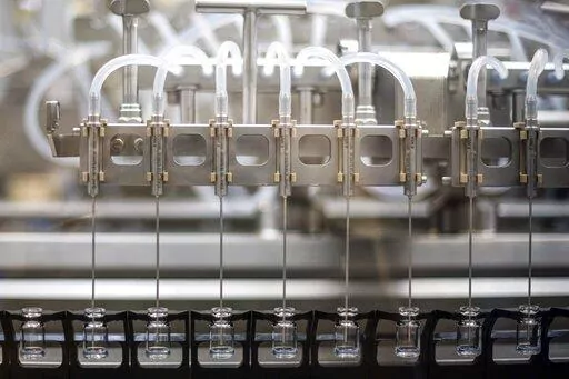 This May 2022 photo provided by Pfizer shows production of the Pfizer's COVID-19 vaccine for children under 5 in Puurs, Belgium.   U.S. health advisers on Saturday, June 18,  recommended COVID-19 vaccines for infants, toddlers and preschoolers — the last group without the shots. (Pfizer via AP)