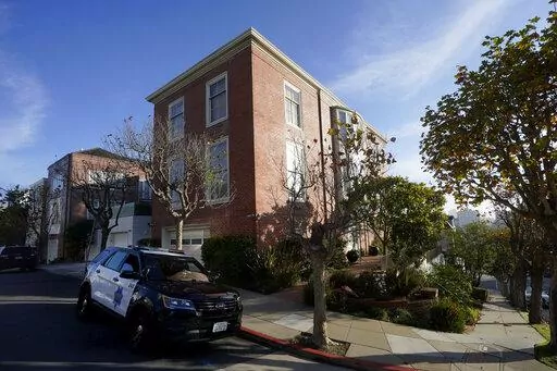 A San Francisco Police Department vehicle parks outside the home of Speaker of the House Nancy Pelosi, in San Francisco, Saturday, Oct. 29, 2022.  On Friday, Nov. 4, The Associated Press reported on stories circulating online incorrectly claiming the attack on Paul Pelosi was a “Domestic Violence Case in a consensual sexual relationship." (AP Photo/Jeff Chiu, File)