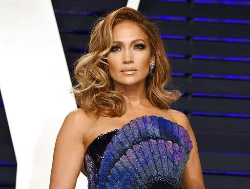 Jennifer Lopez arrives at the Vanity Fair Oscar Party on Feb. 24, 2019, in Beverly Hills, Calif. Lopez will be honored for her film and television achievements at the MTV Movie & TV Awards. The network announced Friday that Lopez will receive the Generation Award on Sunday in Santa Monica, Calif. (Photo by Evan Agostini/Invision/AP, File)