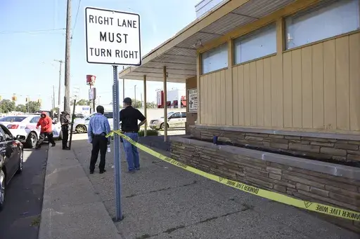 Detroit Police investigate the scene of a homicide on Aug. 28, 2022, in Detroit. (Jose Juarez/Special to Detroit News via AP, File)/Detroit News via AP)
