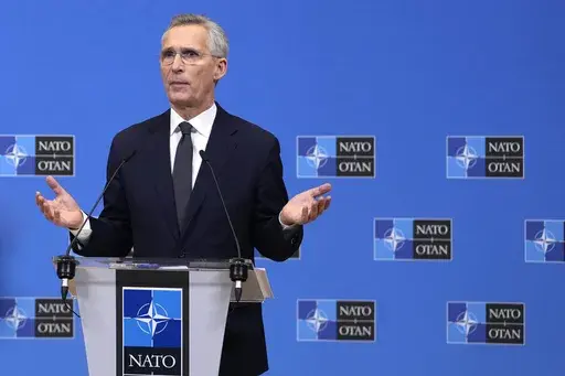NATO Secretary General Jens Stoltenberg addresses a media conference prior to a meeting of NATO defense ministers at NATO headquarters in Brussels, Wednesday, Feb. 14, 2024. (AP Photo/Virginia Mayo)