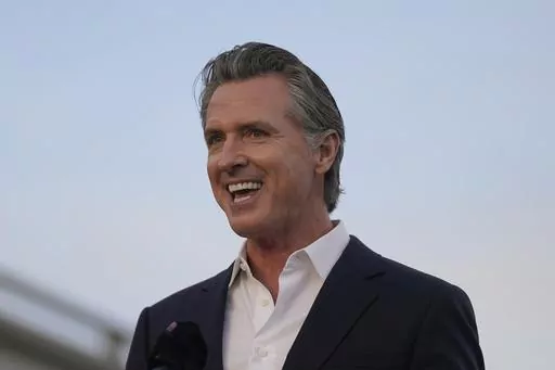 California Gov. Gavin Newsom speaks during a Clean California event in San Francisco, Thursday, Nov. 9, 2023. California becomes one of the first states to provide free health care to all low-income adults regardless of their immigration status starting Monday. (AP Photo/Jeff Chiu, File)