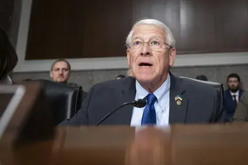 Chairman Roger Wicker, R-Miss., speaks to Stephen Feinberg, President Donald Trump's choice to be deputy secretary of defense, as he appears before the Senate Armed Services Committee for his confirmation hearing, on Capitol Hill in Washington, Tuesday, Feb. 25, 2025. (AP Photo/Ben Curtis)