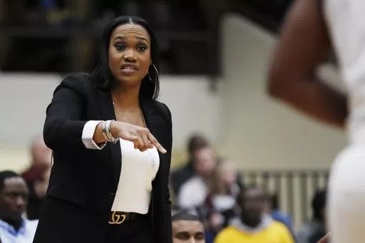 Jackson State coach Tomekia Reed calls out to her team during the first half of an NCAA college basketball game against Mississippi State, Thursday, Nov. 21, 2019, in Jackson, Miss. Charlotte announced the hiring of Tomekia Reed as women’s basketball coach on Thursday, April 25, 2024, after she helped Jackson State win five consecutive Southwestern Athletic Conference championships during a highly successful six-year tenure with the Tigers. (AP Photo/Rogelio V. Solis, File)
