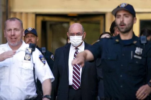 Law enforcement personnel escort the Trump Organization's former Chief Financial Officer Allen Weisselberg, center, as he departs court, Friday, Aug. 12, 2022, in New York. Former President Donald Trump’s longtime finance chief is expected to plead guilty as soon as Thursday, Aug. 18 in a tax evasion case that is the only criminal prosecution to arise from a long-running investigation into the former president’s company, three people familiar with the matter told The Associated Press. (AP Ph