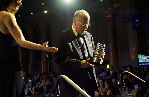 This photo provided by Webby Awards, Stephen Wilhite accepts his Webby lifetime achievement award on May 2013 in New York.  Wihite, he inventor of the internet-popular short-video format, the GIF, has died.   His wife, Kathaleen, said Thursday, March 24, 2022, in a phone interview that he died of COVID on March 14.     (Webby Awards via AP)