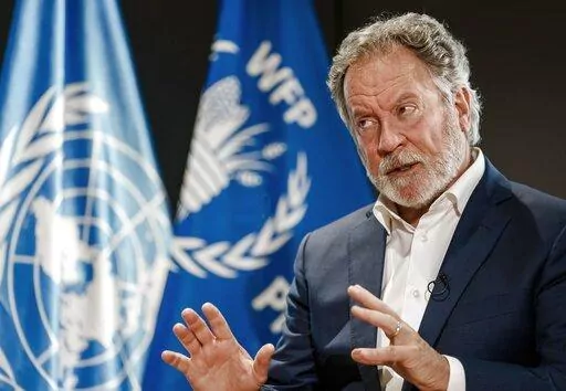World Food Program Executive Director David Beasley speaks during an interview with The Associated Press at the WFP headquarters in Rome, Nov. 2, 2021. Beasley announced Saturday, Dec. 17, 2022, that he will step down from his role as executive director of the U.N. World Food Program, ending a six-year term heading the world’s largest humanitarian organization. (AP Photo/Domenico Stinellis, File)
