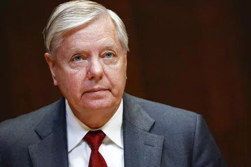 Sen. Lindsey Graham, R-S.C., listens during a hearing on the fiscal year 2023 budget for the FBI in Washington, on May 25, 2022. Attorneys for Graham said in a court filing on July 13, he wasn't trying to interfere in Georgia's 2020 election when he called state officials to ask them to reexamine certain absentee ballots after President Donald Trump's narrow loss to Democrat Joe Biden. (Ting Shen/Pool Photo via AP, File)