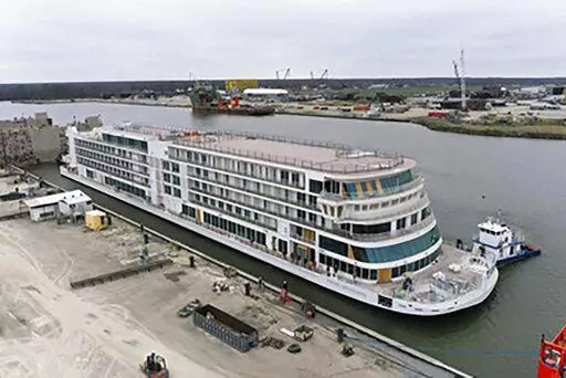 This photo provided by Viking shows the Viking Mississippi at Edison Chouest Offshore's LaShip shipyard in Houma, La., on March 7, 2022.  The Swiss company’s cruises along the length of the Mississippi River are a step closer to reality — its new 386-passenger ship has touched water for the first time. Viking River Cruises of Basel, which announced plans for Mississippi River cruises in 2015, celebrated the “float out” of the Viking Mississippi on Monday, March 7, at Edison Chouest Off