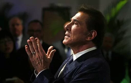 Former Las Vegas casino mogul Steve Wynn gestures at a news conference in Medford, Mass., March 15, 2016. An effort by Nevada casino regulators to impose a $500,000 fine and discipline former Las Vegas casino mogul Wynn over allegations of workplace sexual misconduct had new life Friday, April 1, 2022, after a state Supreme Court decision in a jurisdictional question. Wynn denies all allegations against him. (AP Photo/Charles Krupa, File)