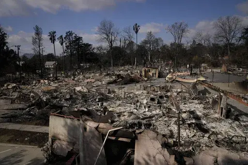 The Eaton Fire leaves devastation in a neighborhood Friday, Jan. 17, 2025 in Altadena, Calif. (AP Photo/Jae C. Hong)