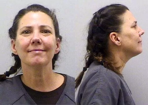 This undated booking photo provided by the Douglas County Sheriff's Office, in Colorado, shows Cynthia Abcug. The Colorado mother accused of plotting to kidnap her son from foster care after her teen daughter said she started associating with supporters of the QAnon conspiracy theory was found guilty of conspiracy to commit second-degree kidnapping on Friday, Aug. 26, 2022. (Douglas County Sheriff's Office via AP, File)