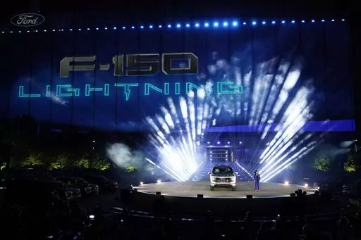 Ford's Chief Executive Engineer Linda Zhang unveils the Ford F-150 Lightning on May 19, 2021, in Dearborn, Mich. Ford Motor Co. announced Thursday, March 23, 2023, that their electric vehicle business has lost $3 billion before taxes during the past two years and will lose a similar amount this year as the company invests heavily in the new technology. (AP Photo/Carlos Osorio, File)