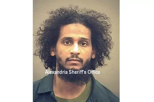 In this photo provided by the Alexandria Sheriff's Office is El Shafee Elsheikh who is in custody at the Alexandria Adult Detention Center, Oct. 7, 2020, in Alexandria, Va.   Elsheikh has been sentenced to life in prison for his role in the deaths of four U.S. hostages captured by the Islamic State. Prosecutors say El Shafee Elsheikh is the most notorious member of the Islamic State ever to be convicted at trial in a U.S. court. (Alexandria Sheriff's Office via AP, File)