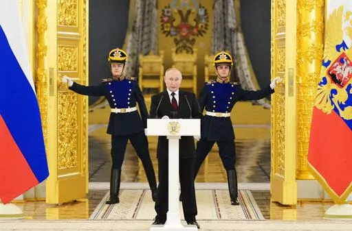 Russian President Vladimir Putin speaks during a ceremony to receive credentials from foreign ambassadors in Kremlin, in Moscow, Russia, Dec. 1, 2021. (Grigory Sysoev, Sputnik, Kremlin Pool Photo via AP)