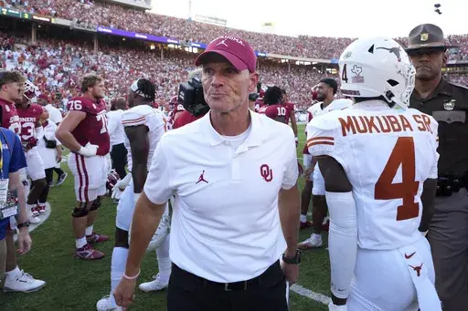 Oklahoma head football coach Brent Venables walks off the field after his team's 34-3 loss to Texas in an NCAA college football game in Dallas, Saturday, Oct. 12, 2024. (AP Photo/Jeffrey McWhorter)